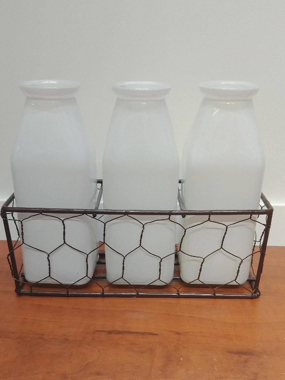 Set of Three White Milk Bottle Vases in Wire Caddy